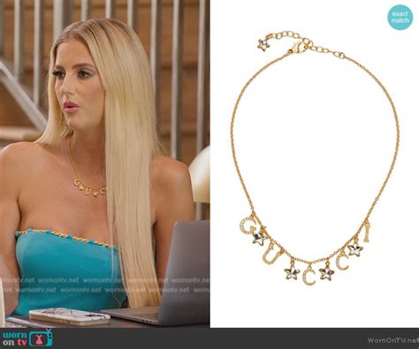 Emma’s gold Gucci necklace on Selling Sunset 